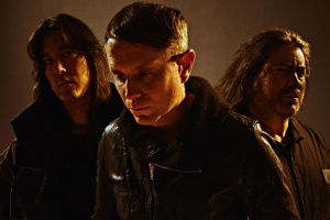 Industriální trio HEALTH zve do kina na Street Fightera i na pražský koncert